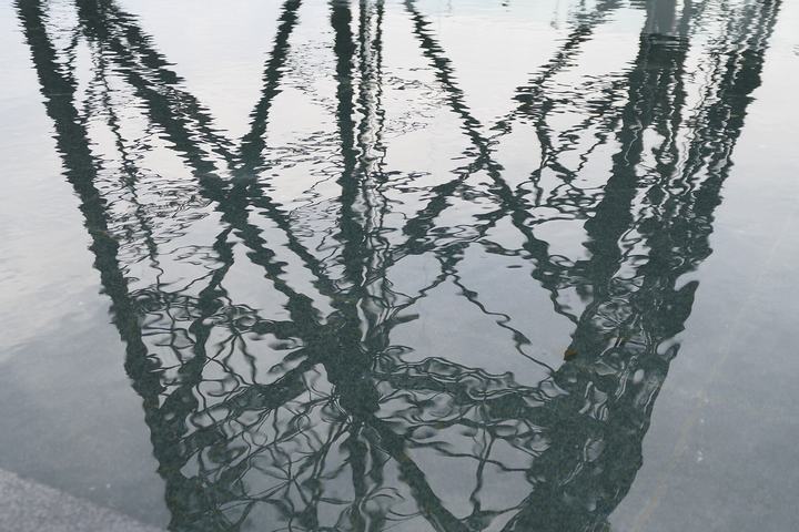 Gliwice — Reflections of the Gliwice Radio Tower in the water of a fountain